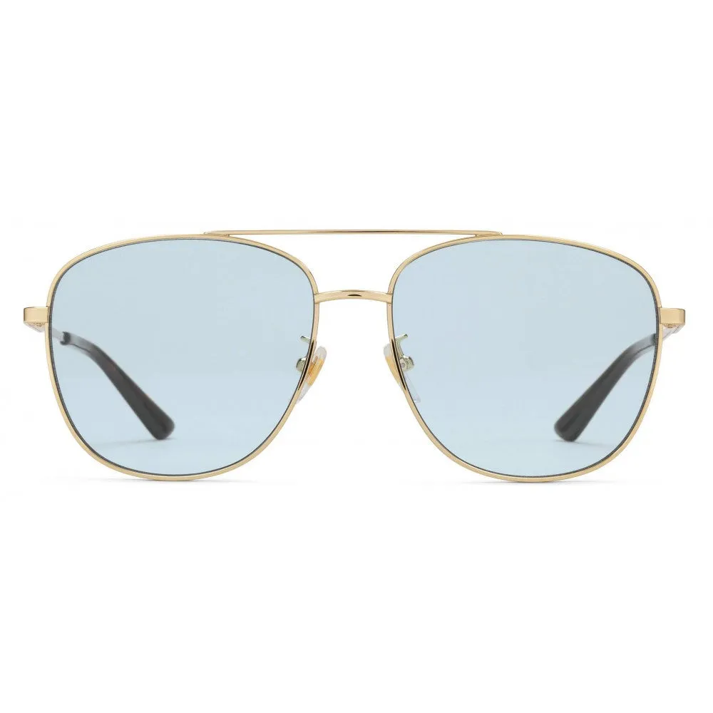 Gucci Metal Framed Navigator Sunglasses in Gold